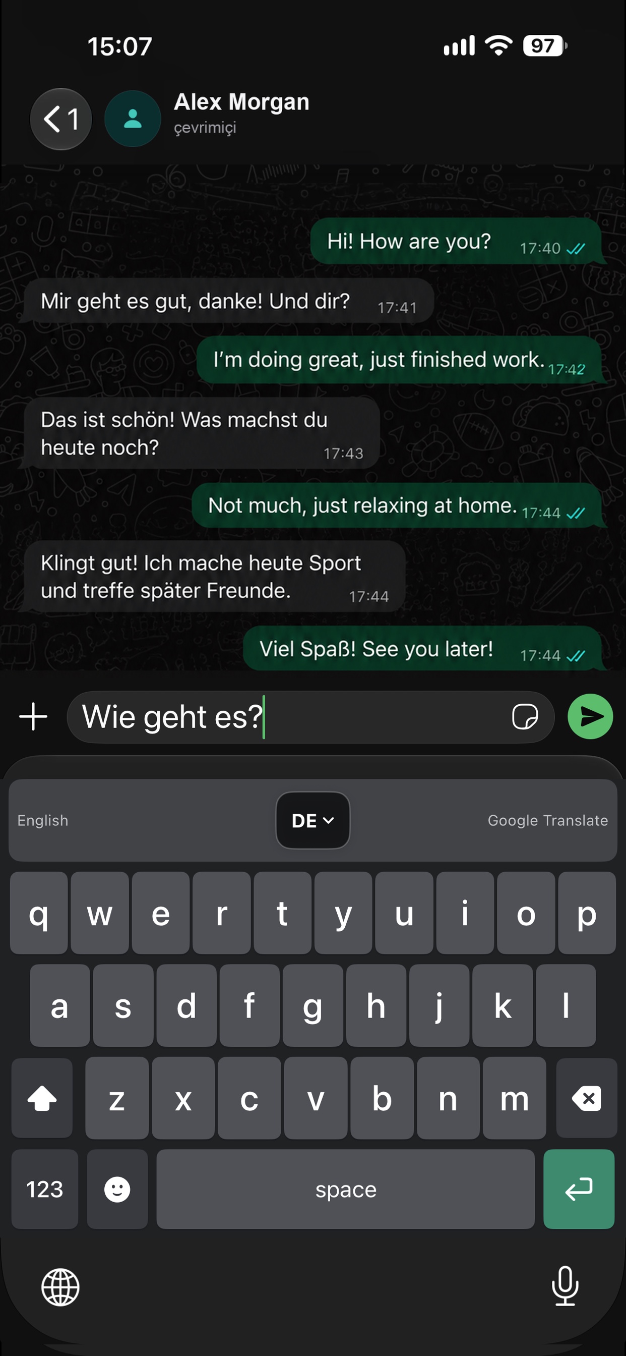 A message being written in English on the Flow Translate keyboard and translated into German inside the messaging app itself